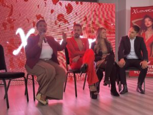 Panel discussion with four speakers on stage
